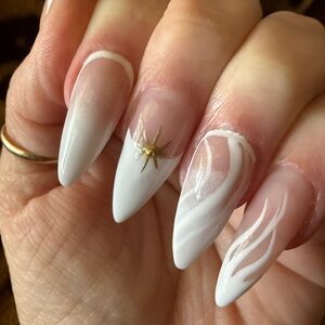Elegant White Nail Art with Gold Accent